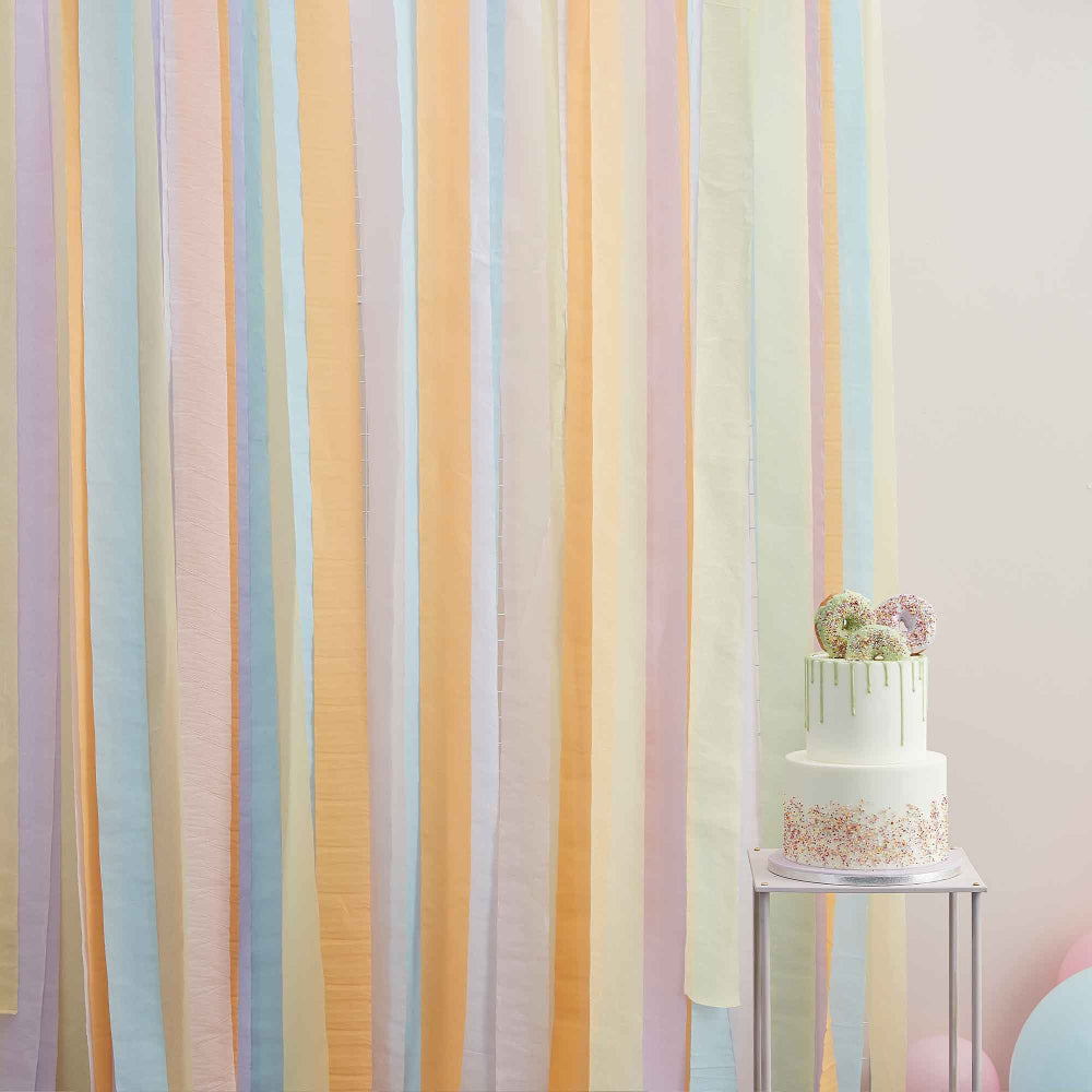 Ginger Ray pastel backdrop, large streamer backdrop, multicoloured party backdrop, pastel event decorations, 100m streamer backdrop, pastel party streamers, pink and yellow streamers, lilac and blue streamers, peach paper streamers, event backdrop decorations, party streamers for birthdays, Ginger Ray party supplies, baby shower backdrop, pastel wedding decorations, multicoloured streamers Australia, glue dot assembly backdrop, pastel photo backdrop, versatile party backdrop, party supplies Australia, Ginge