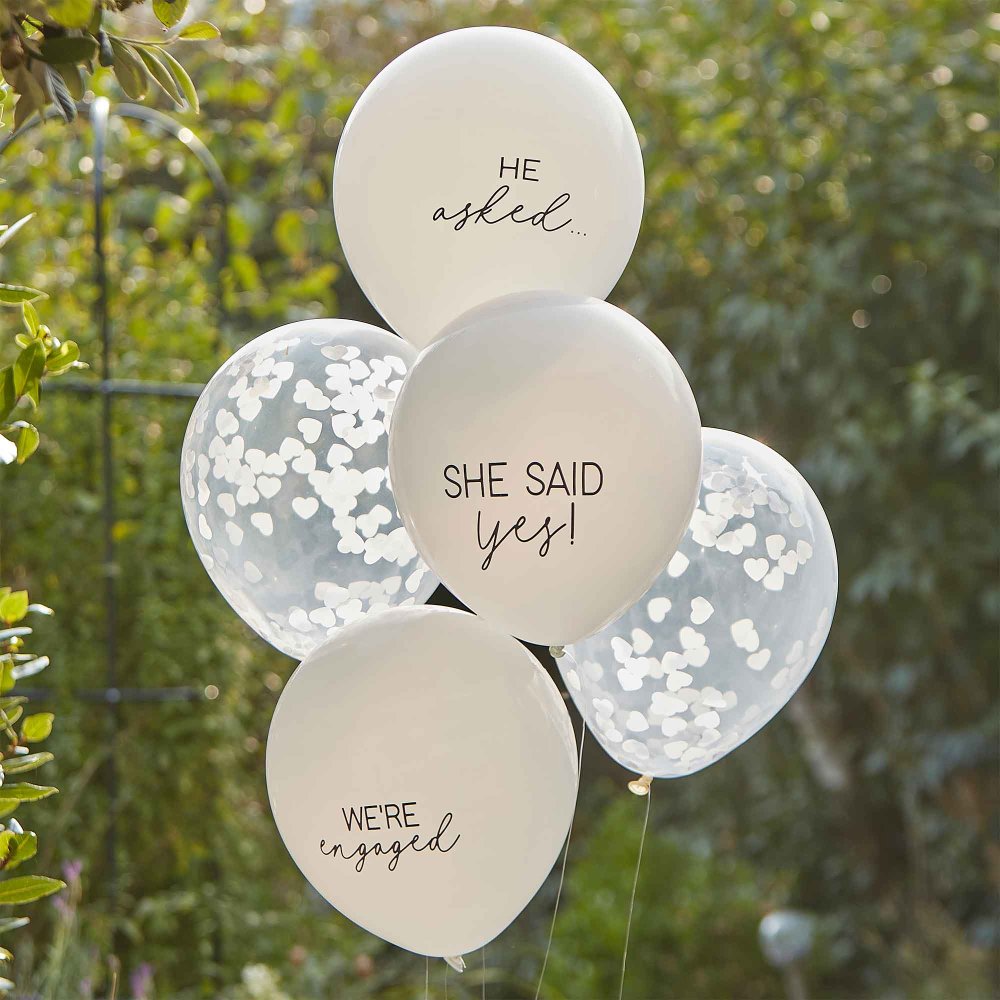 engagement confetti balloons, She Said Yes balloon bundle, engagement party decorations, confetti-filled engagement balloons, engagement celebration decor, 'He asked' balloon, 'She said yes' balloon, We're engaged balloons, clear confetti balloons, heart confetti party balloons, celebration balloon bundle, bridal shower balloon set, stylish engagement decorations, wedding proposal balloons, engagement party balloon pack, romantic engagement decor, heart-shaped confetti-filled balloons, fun engagement decora