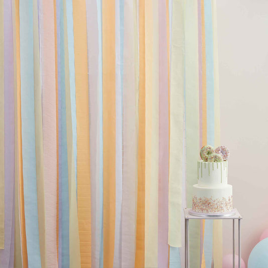 Ginger Ray pastel backdrop, large streamer backdrop, multicoloured party backdrop, pastel event decorations, 100m streamer backdrop, pastel party streamers, pink and yellow streamers, lilac and blue streamers, peach paper streamers, event backdrop decorations, party streamers for birthdays, Ginger Ray party supplies, baby shower backdrop, pastel wedding decorations, multicoloured streamers Australia, glue dot assembly backdrop, pastel photo backdrop, versatile party backdrop, party supplies Australia, Ginge