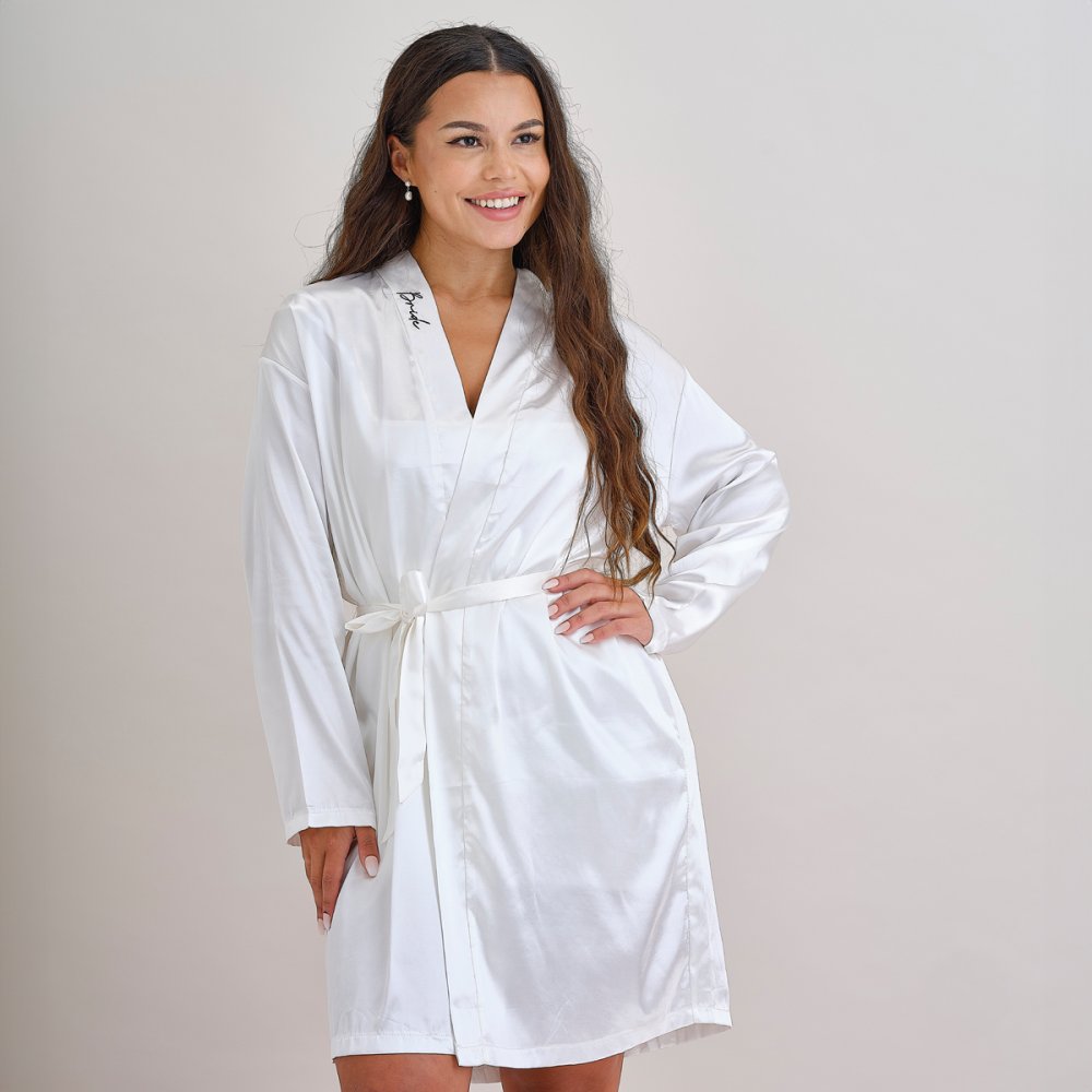 bride dressing gown, hen party robe, white bride robe Australia, embroidered bride gown, Ginger Ray dressing gown, bridal robe black embroidery, wedding morning robe, bride getting ready gown, hen party essentials, stylish bride robe, elegant bridal robe, soft white dressing gown, hen party outfit, bride robe Australia, bride robe one size, bachelorette party gown, Ginger Ray Australia stockist, bridal shower robe, bride to be robe, wedding prep robe, Carseldine party supplies
