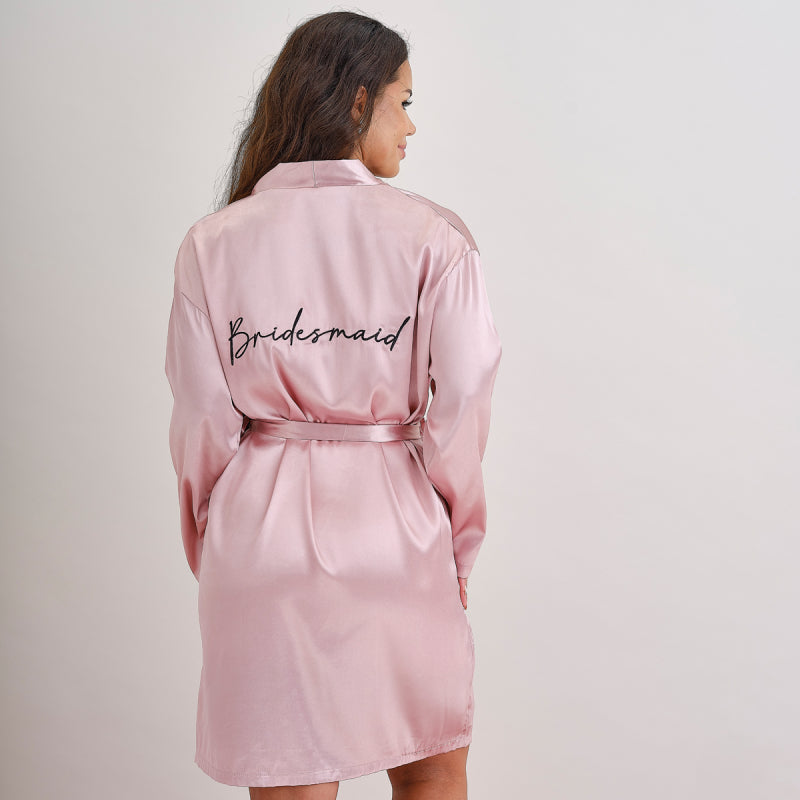 bride dressing gown, hen party robe, white bride robe Australia, embroidered bride gown, Ginger Ray dressing gown, bridal robe black embroidery, wedding morning robe, bride getting ready gown, hen party essentials, stylish bride robe, elegant bridal robe, soft white dressing gown, hen party outfit, bride robe Australia, bride robe one size, bachelorette party gown, Ginger Ray Australia stockist, bridal shower robe, bride to be robe, wedding prep robe, Carseldine party supplies