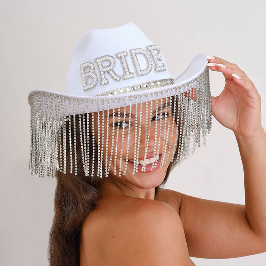 bride cowgirl hat, white bridal cowboy hat, hen party bride hat, western hen do accessories, diamante tassel bride hat, cowgirl wedding hat, white bride party hat, embellished bride hat, bride to be cowboy hat, hen night accessories Australia, bachelorette party hat, honeymoon hat for bride, bridal statement hat, bride fancy dress hat, bride hat with tassels, bride Western hat, white hat for hen party, stylish bride party wear, bride hat one size, photo-worthy bride accessories