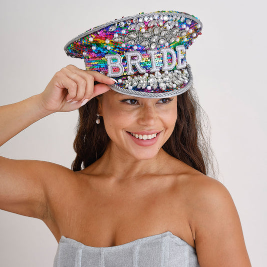 bride hat multi-coloured, embellished bride hat, hen party bride hat, rhinestone bridal hat, festival style bride hat, bachelorette accessories Australia, bride hat with gems, Instagrammable hen party hat, statement bridal hat, colourful bride hat, bride party headwear, bold bride hat, hen do party accessories, white hat with embellishments, hen night bride hat, bride to be hat Australia, bridal shower photo prop, fun bride party hat, bride costume hat, standout bride hat

